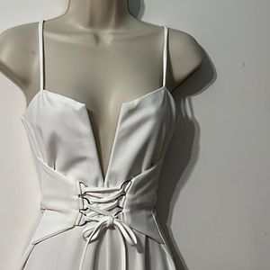 Luxxel White Jumpsuit with Spaghetti Straps Tie up Lace Front Slim Legs small